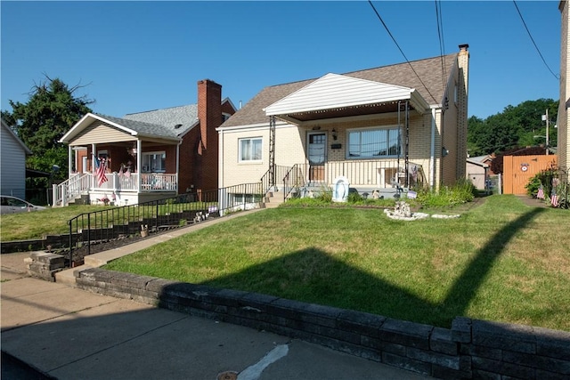 1819 Sundeman St, Troy Hill, PA 15212 - bungalow-style house with covered porch, brick siding, and a chimney