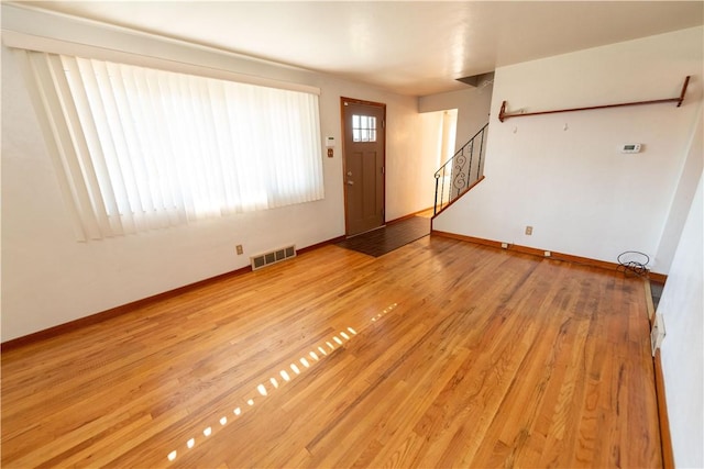 1819 Sundeman St, Troy Hill, PA 15212 - foyer entrance featuring light wood finished floors and stairs