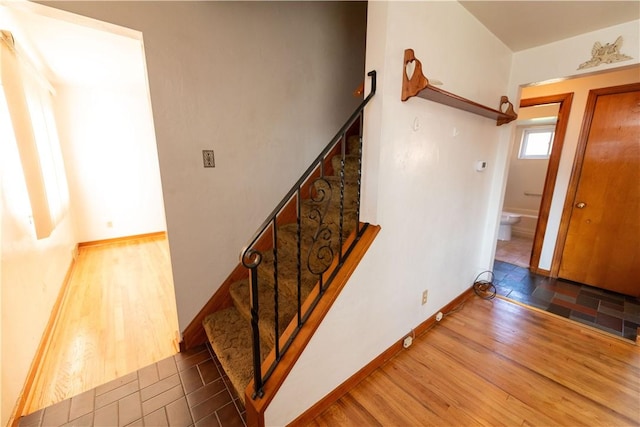1819 Sundeman St, Troy Hill, PA 15212 - staircase with wood finished floors and baseboards