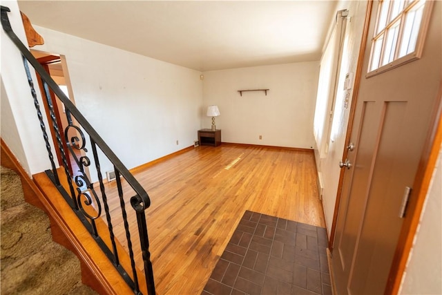 1819 Sundeman St, Troy Hill, PA 15212 - foyer with wood finished floors and stairs