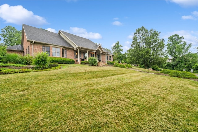 14 Amy Way S, Union Twp, PA 15401 - view of front facade with brick siding, a front yard, and roof with shingles