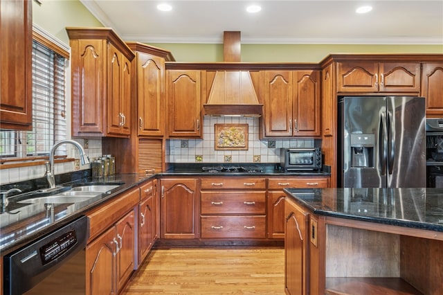 14 Amy Way S, Union Twp, PA 15401 - kitchen with black appliances, custom exhaust hood, light wood-style floors, tasteful backsplash, and dark stone counters