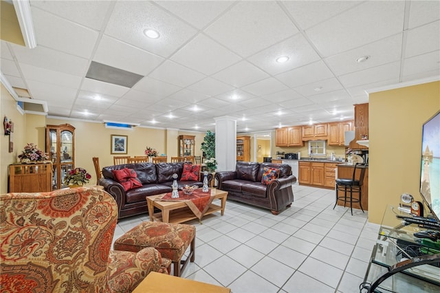 14 Amy Way S, Union Twp, PA 15401 - living area with light tile patterned floors, a paneled ceiling, and decorative columns