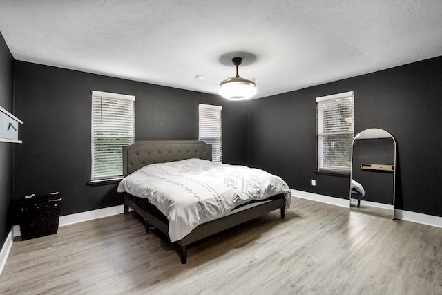 1819 Craig St, Mckeesport, PA 15132 - bedroom with multiple windows and light wood finished floors