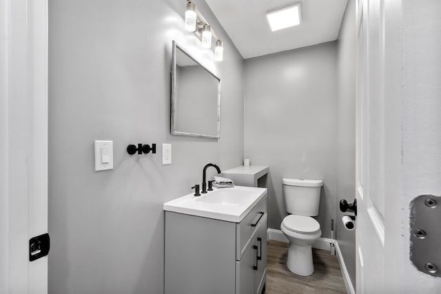 1819 Craig St, Mckeesport, PA 15132 - bathroom with vanity and wood finished floors