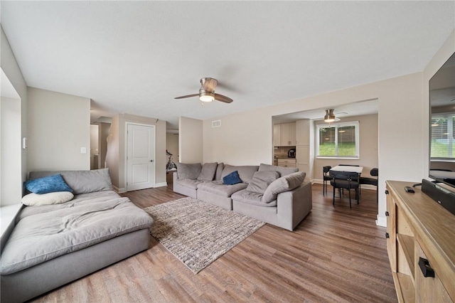 2047 Haymaker Rd, Monroeville, PA 15146 - living area with ceiling fan and wood finished floors