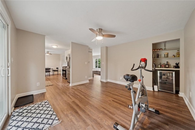 2047 Haymaker Rd, Monroeville, PA 15146 - workout area featuring ceiling fan, wine cooler, and light wood finished floors