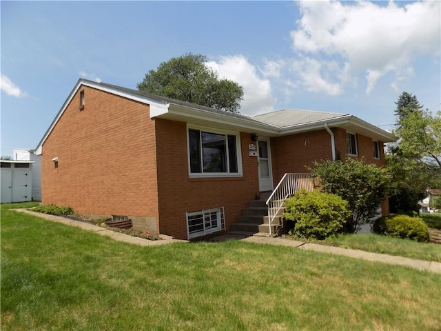 3055 Fadette St, Sheraden, PA 15204 - view of front facade with brick siding and a front yard