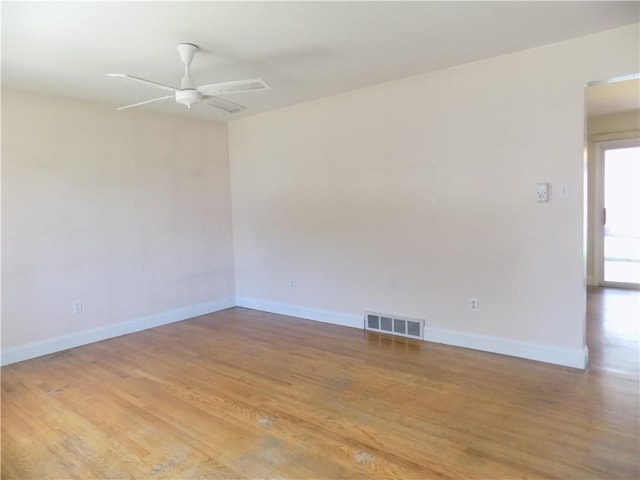 3055 Fadette St, Sheraden, PA 15204 - empty room with light wood-style floors and a ceiling fan