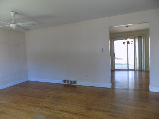 3055 Fadette St, Sheraden, PA 15204 - unfurnished room with a chandelier, wood finished floors, and ceiling fan