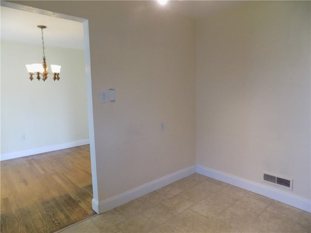 3055 Fadette St, Sheraden, PA 15204 - unfurnished room with a chandelier and baseboards