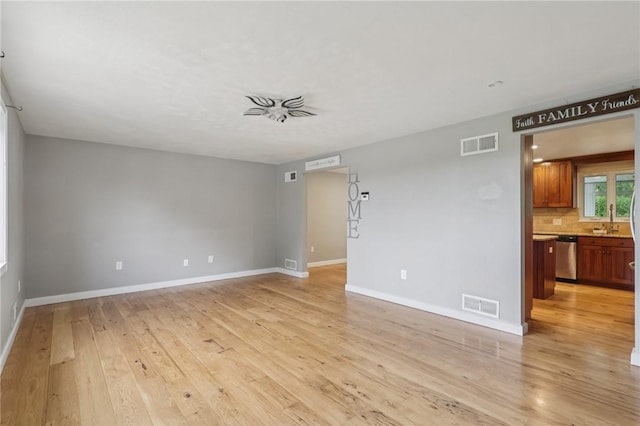 1717 Gina Dr, West Mifflin, PA 15122 - unfurnished room with light wood-style floors and baseboards