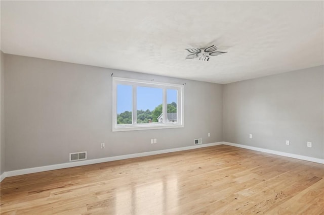 1717 Gina Dr, West Mifflin, PA 15122 - empty room with light wood finished floors