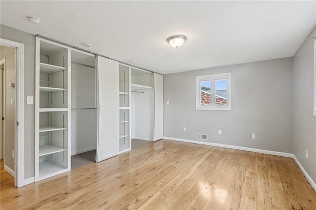 1717 Gina Dr, West Mifflin, PA 15122 - unfurnished bedroom with light wood-type flooring and a closet