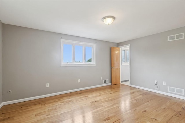 1717 Gina Dr, West Mifflin, PA 15122 - spare room with baseboards and wood finished floors