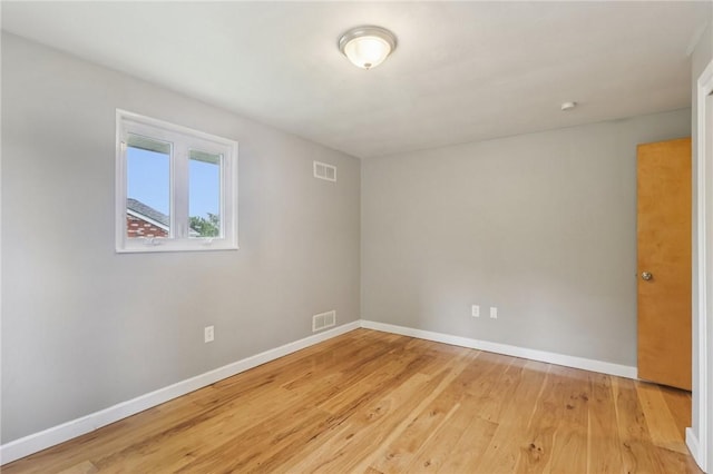 1717 Gina Dr, West Mifflin, PA 15122 - spare room featuring baseboards and light wood-style floors