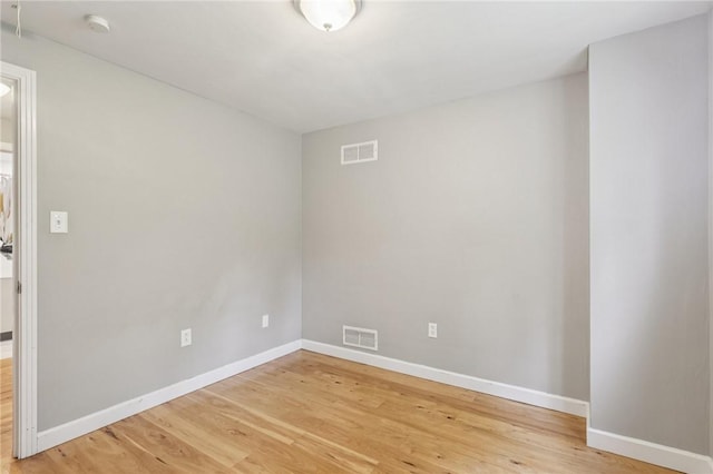 1717 Gina Dr, West Mifflin, PA 15122 - spare room featuring light wood finished floors and a smoke detector