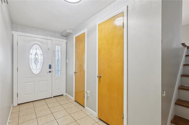 1717 Gina Dr, West Mifflin, PA 15122 - entryway featuring stairway and light tile patterned floors