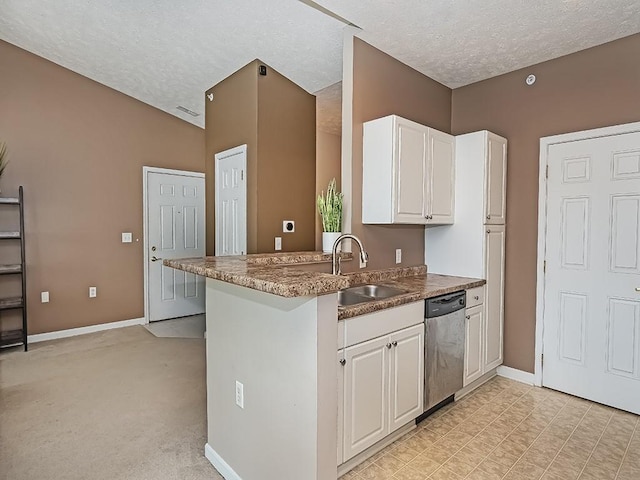 310 Stockton Rdg, Cranberry Twp, PA 16066 - kitchen featuring dishwasher, a textured ceiling, white cabinetry, and a peninsula