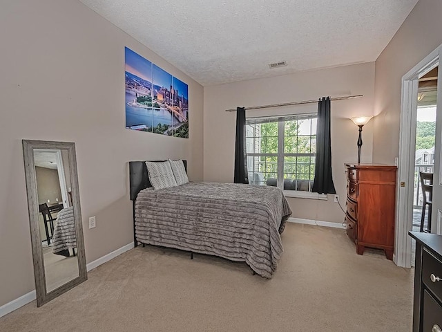 310 Stockton Rdg, Cranberry Twp, PA 16066 - bedroom featuring a textured ceiling, light colored carpet, and multiple windows