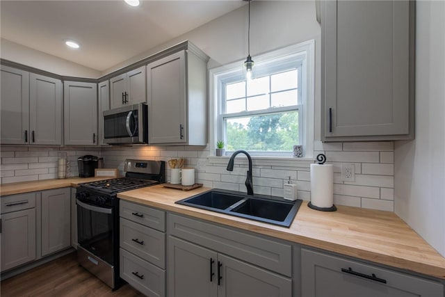 190 Hillview Manor Rd, Gilpin Twp, PA 15656 - kitchen featuring appliances with stainless steel finishes, butcher block counters, gray cabinetry, backsplash, and recessed lighting