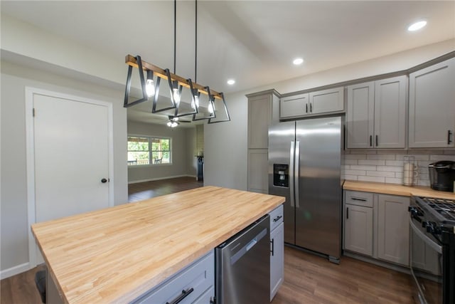 190 Hillview Manor Rd, Gilpin Twp, PA 15656 - kitchen with wood counters, appliances with stainless steel finishes, gray cabinetry, dark wood-style flooring, and recessed lighting