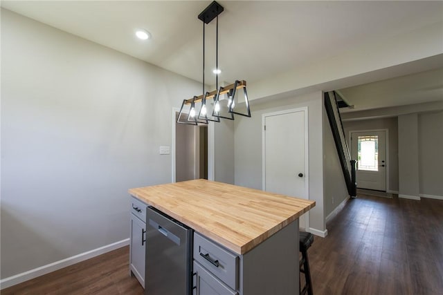 190 Hillview Manor Rd, Gilpin Twp, PA 15656 - kitchen featuring butcher block counters, dark wood-style flooring, a kitchen bar, a kitchen island, and pendant lighting