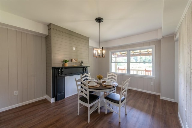 190 Hillview Manor Rd, Gilpin Twp, PA 15656 - dining space featuring wood finished floors, a chandelier, and wooden walls