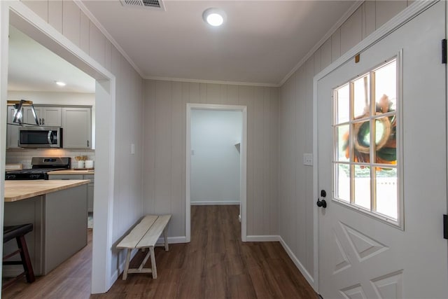 190 Hillview Manor Rd, Gilpin Twp, PA 15656 - doorway with crown molding, dark wood-style floors, and plenty of natural light