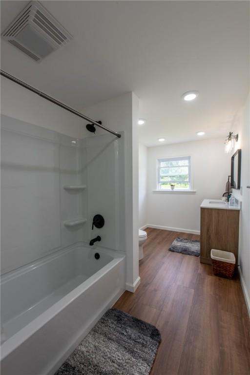 190 Hillview Manor Rd, Gilpin Twp, PA 15656 - full bathroom featuring vanity, shower / tub combination, wood finished floors, and recessed lighting