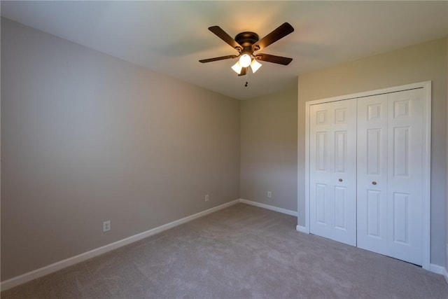 190 Hillview Manor Rd, Gilpin Twp, PA 15656 - unfurnished bedroom with carpet, a closet, and a ceiling fan