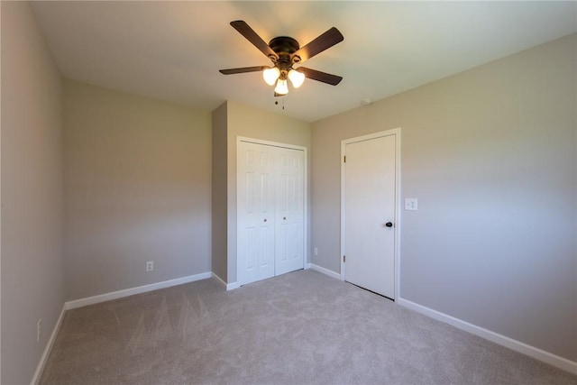 190 Hillview Manor Rd, Gilpin Twp, PA 15656 - unfurnished bedroom featuring carpet flooring, a closet, and a ceiling fan