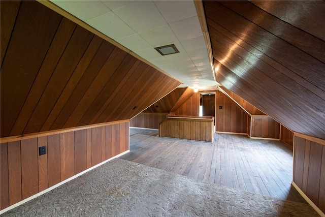 190 Hillview Manor Rd, Gilpin Twp, PA 15656 - additional living space featuring wood walls, hardwood / wood-style flooring, and vaulted ceiling