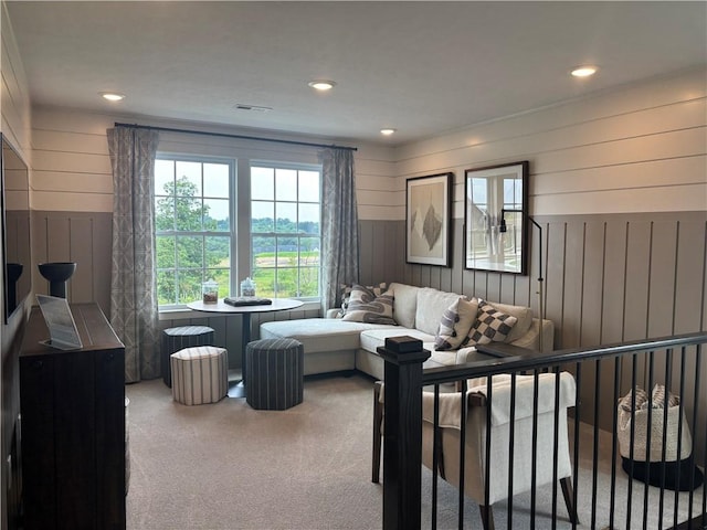 116 Mesa Dr, Moon/Crescent Twp, PA 15108 - living area featuring carpet floors, wood walls, recessed lighting, and wainscoting