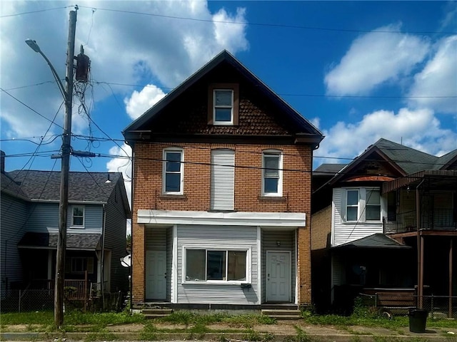1411 Walnut Ave, Monessen, PA 15062 - rear view of property featuring brick siding