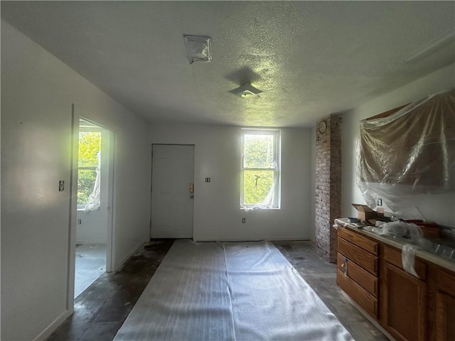 1411 Walnut Ave, Monessen, PA 15062 - foyer entrance featuring a textured ceiling