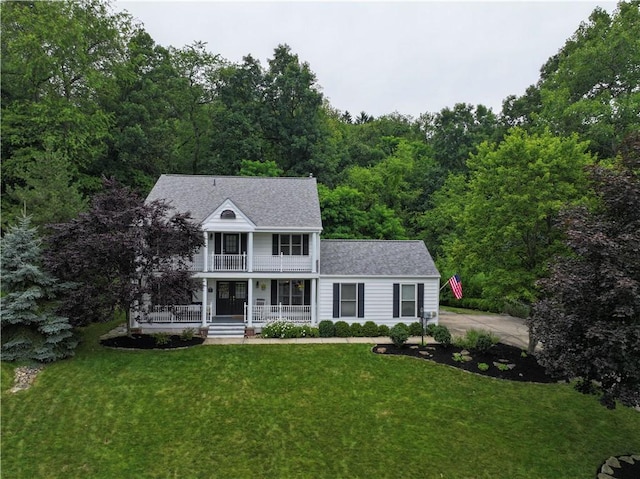 314 Westburn Ct, Seven Fields Boro, PA 16046 - view of front of property with covered porch, a balcony, a front yard, and roof with shingles