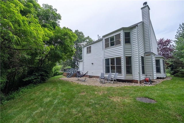 314 Westburn Ct, Seven Fields Boro, PA 16046 - back of property with a chimney and a yard