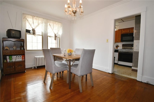 2464-2466 Beechwood Blvd, Squirrel Hill, PA 15217 - dining room featuring radiator, a chandelier, wood finished floors, and crown molding