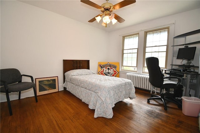 2464-2466 Beechwood Blvd, Squirrel Hill, PA 15217 - bedroom featuring radiator heating unit, wood finished floors, an office area, and a ceiling fan