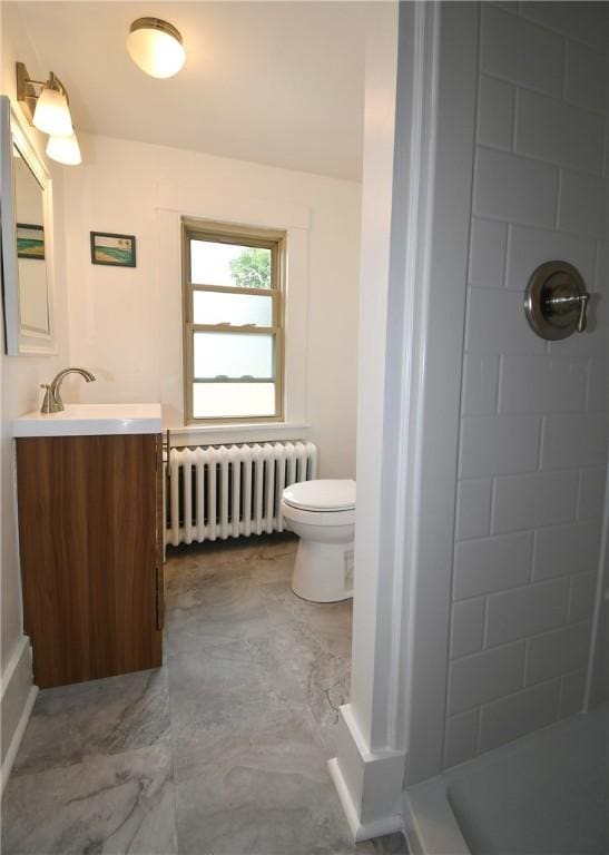 2464-2466 Beechwood Blvd, Squirrel Hill, PA 15217 - bathroom with radiator, vanity, and a tile shower
