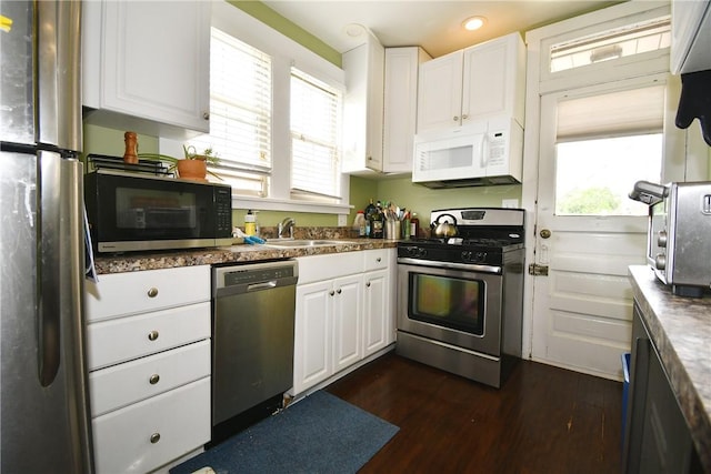 2464-2466 Beechwood Blvd, Squirrel Hill, PA 15217 - kitchen with appliances with stainless steel finishes, white cabinets, dark wood-type flooring, dark countertops, and recessed lighting