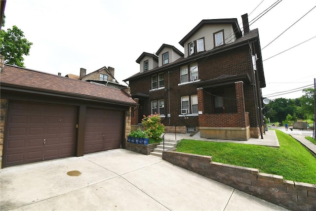 2464-2466 Beechwood Blvd, Squirrel Hill, PA 15217 - view of front of home featuring brick siding, an outbuilding, and a garage