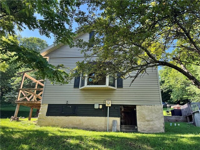 108 Hill St, Coaldale, PA 16679 - view of home's exterior featuring a yard and a wooden deck