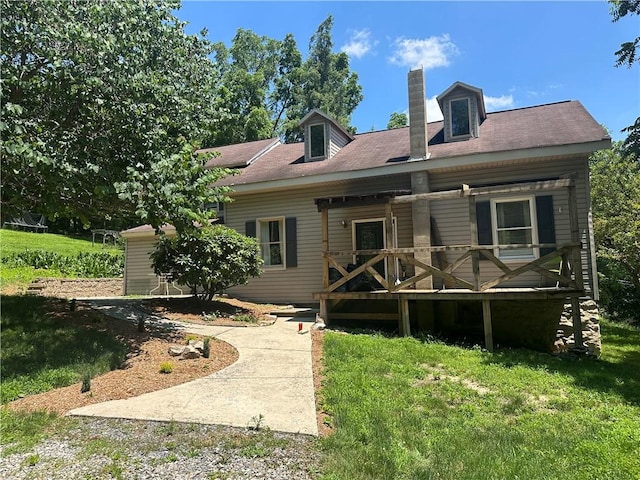 108 Hill St, Coaldale, PA 16679 - back of property featuring a chimney, a porch, and a lawn