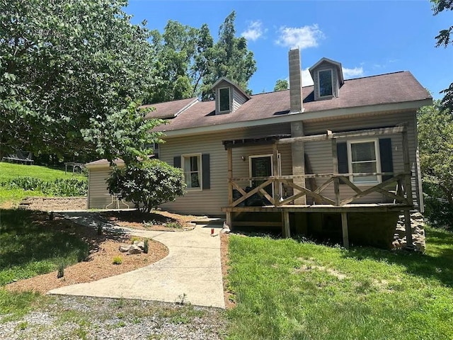108 Hill St, Coaldale, PA 16679 - rear view of house featuring a chimney, covered porch, and a yard