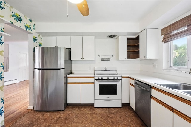 110 Marian Ave, Shaler, PA 15116 - kitchen featuring stainless steel appliances, a baseboard heating unit, open shelves, white cabinetry, and light countertops