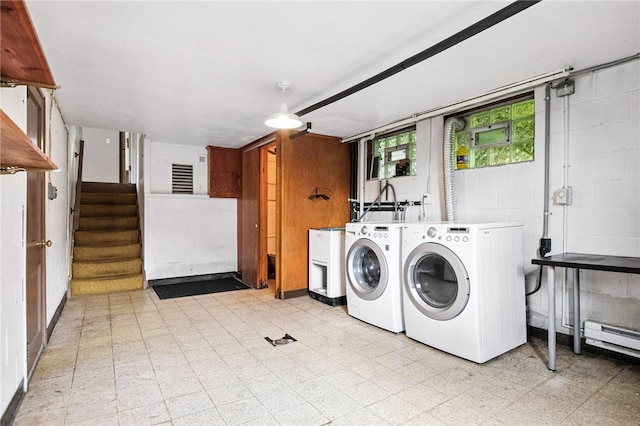 110 Marian Ave, Shaler, PA 15116 - washroom with independent washer and dryer, light floors, baseboard heating, and concrete block wall
