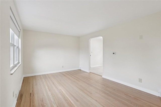 106 Crestline Dr, Ross Twp, PA 15237 - empty room with light wood-type flooring and arched walkways