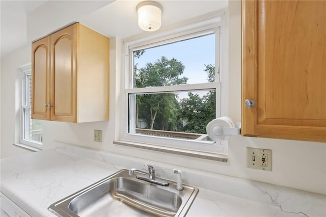 106 Crestline Dr, Ross Twp, PA 15237 - kitchen featuring light stone countertops and light brown cabinetry